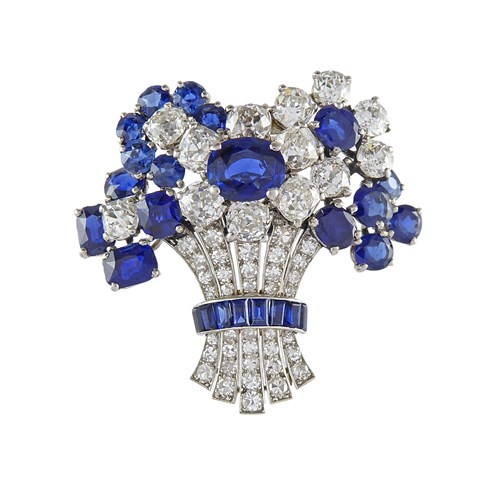Sapphire and diamond tied bouquet brooch by Cartier, London, of stylised design,